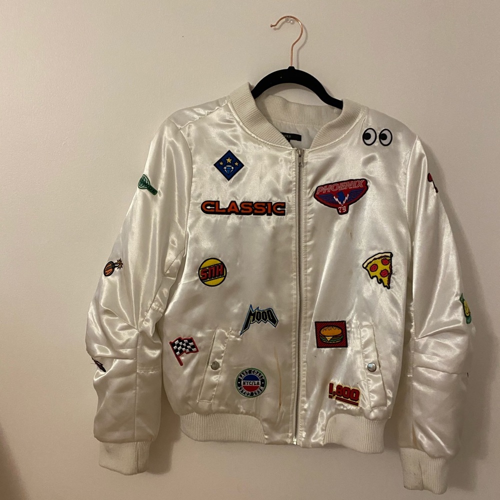 Puffy bomber jacket with original patches across
